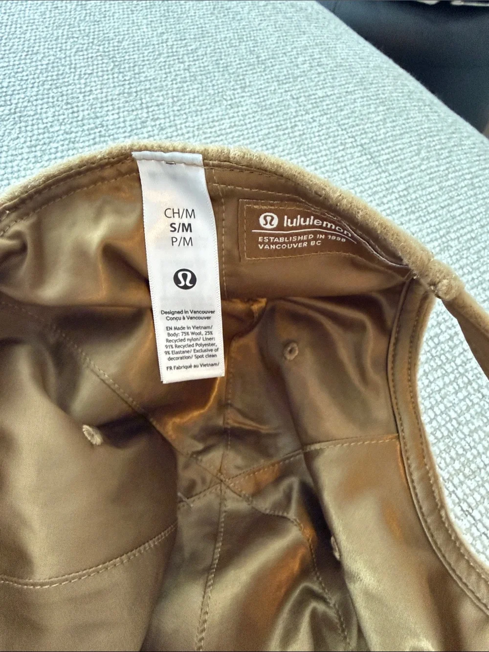 lululemon athletica tan brown wool cap with metal logo clasp